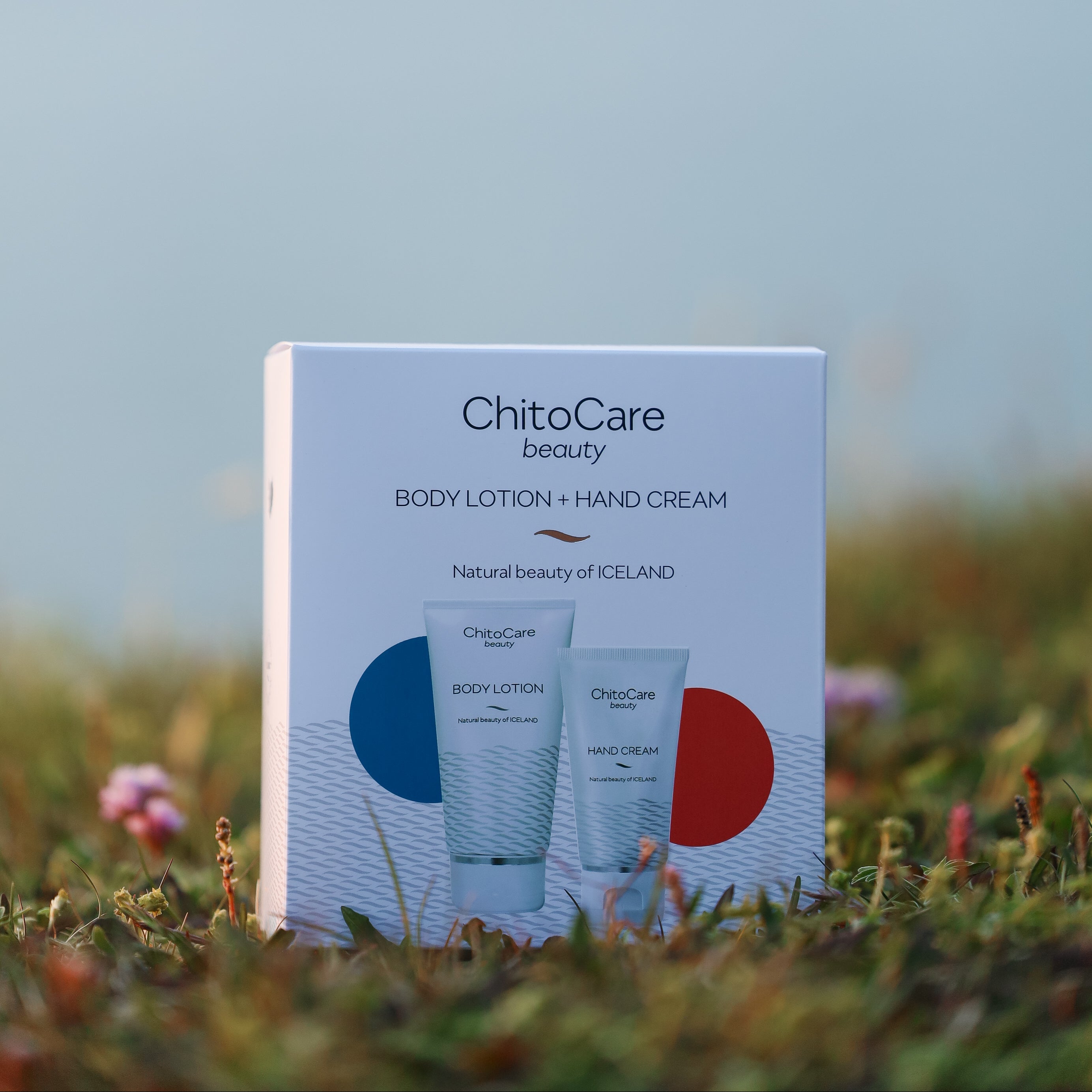 ChitoCare beauty product packaging on grass with a blurred background